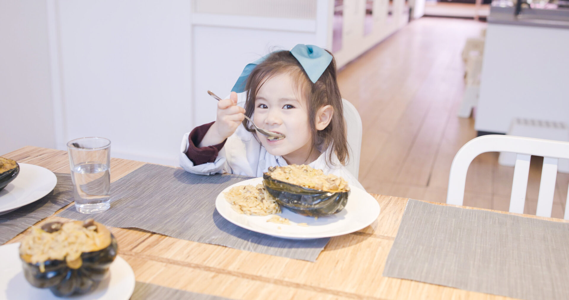 LKA Student eating stuffed squash