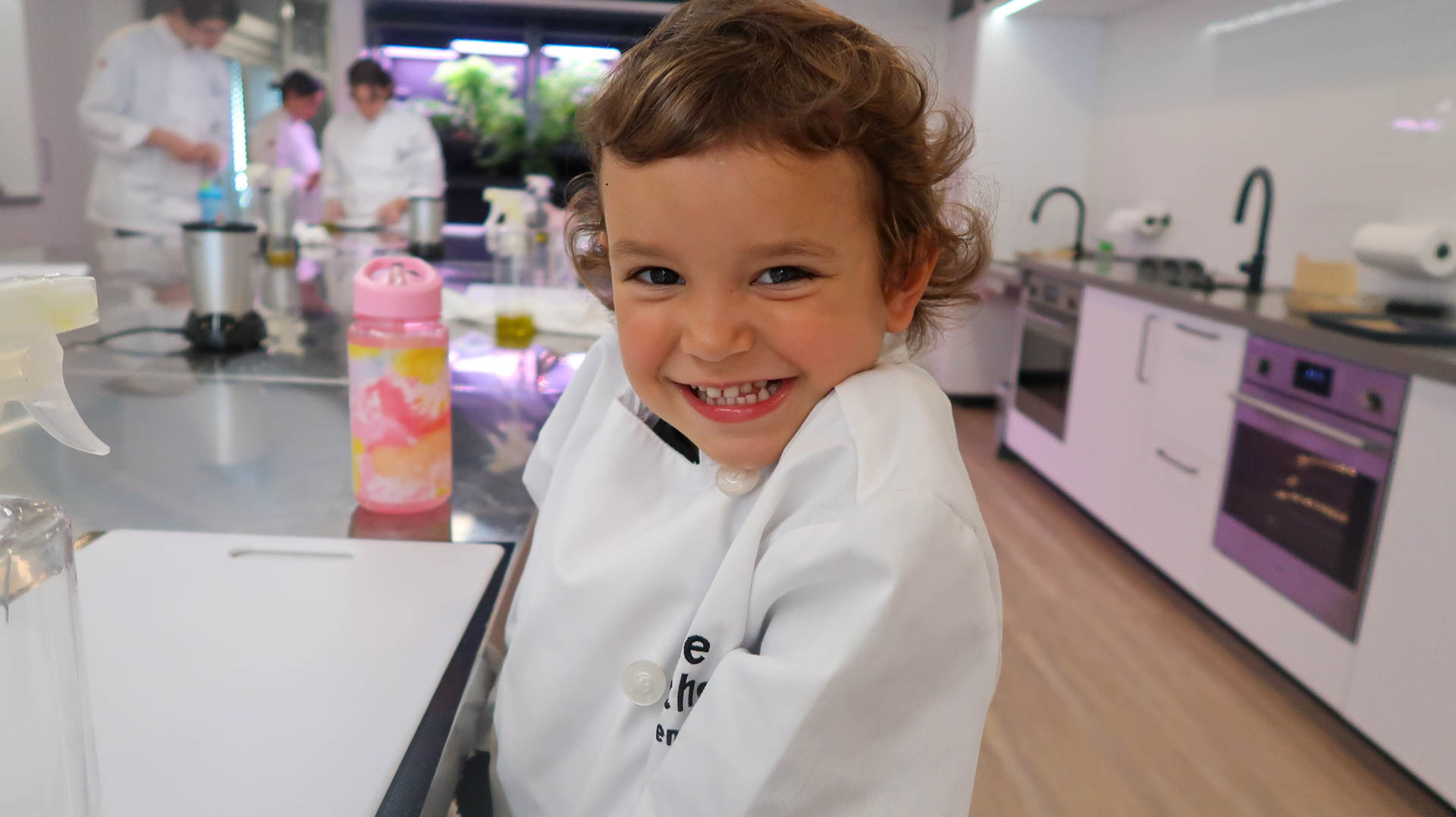 Little Kitchen Academy smiling student