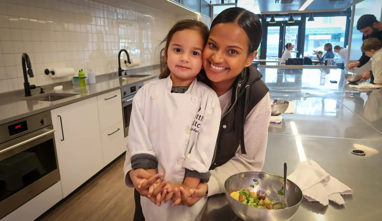 Toddler and caregiver at Little Kitchen Academy's Toddlers First Taste Class