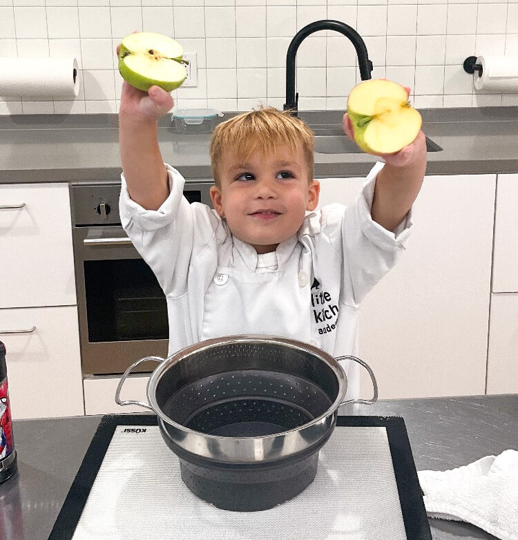 LKA student hold up apples