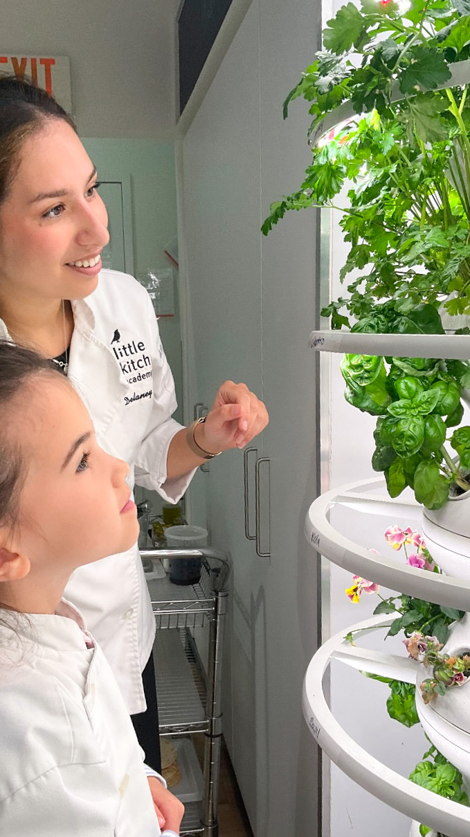 LKA Student exploring a living food wall