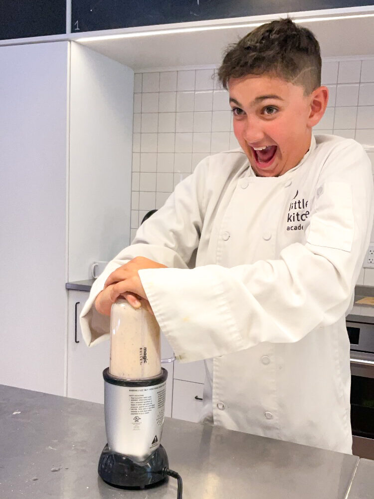 Teenage student using blender at LKA