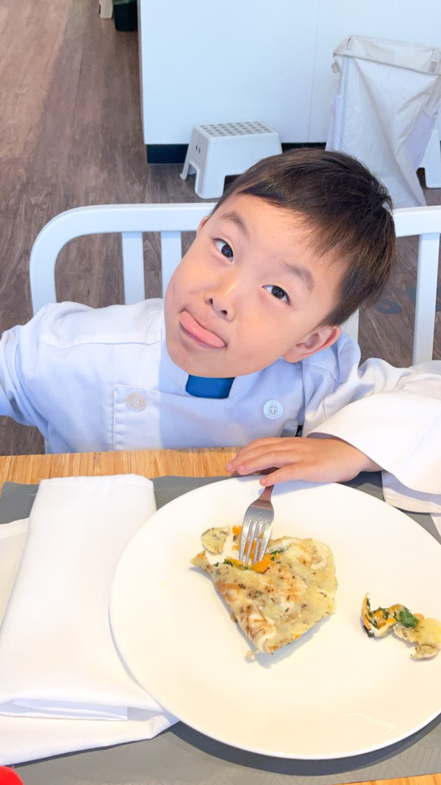 LKA student eating omelette