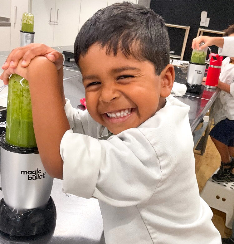 Montessori at Home: LKA student using blender