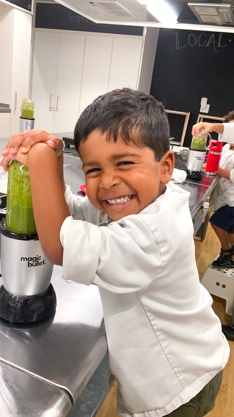 Montessori at Home: LKA student using blender