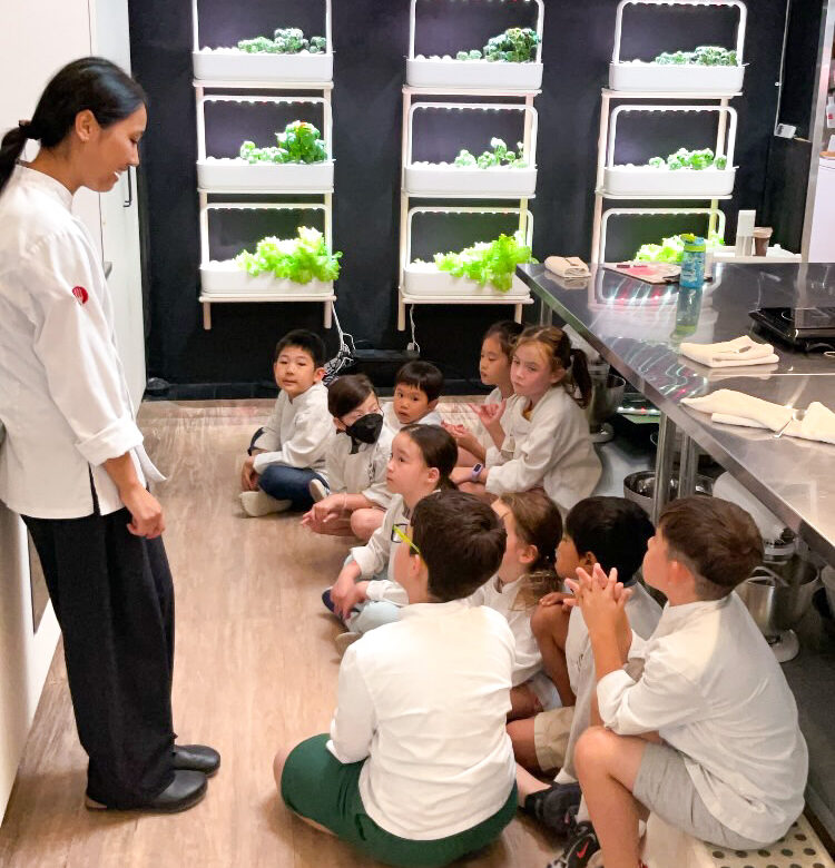 Students learning about oven safety