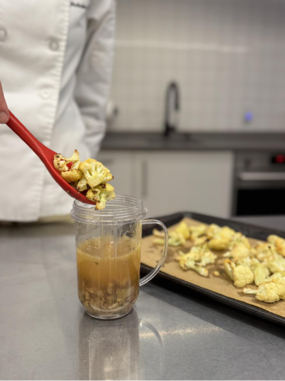 kids learning kitchen skills making soup